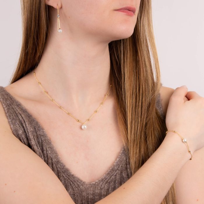Halskette Gelbgold mit Muschelkernperle und Kugelsegmenten